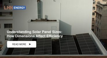 An overhead view of rooftop solar panels on a white building.