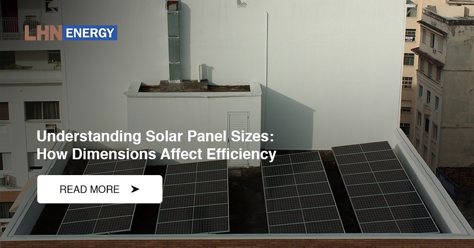 An overhead view of rooftop solar panels on a white building.