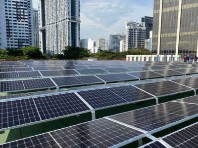 office building with rows of solar panel
